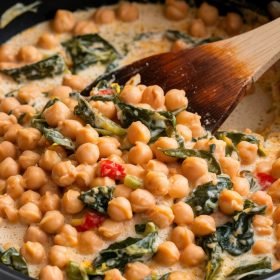 Close-up of rich and flavorful Marry Me Chickpeas in a savory tomato and herb sauce.