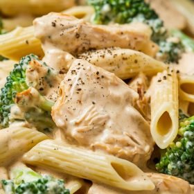 Creamy chicken and broccoli pasta tossed in garlic sauce and topped with Parmesan cheese